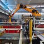 fully automatic rock wool insulated sandwich panel production line with robot stacking system