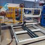fully automatic rock wool insulated sandwich panel production line with robot stacking system